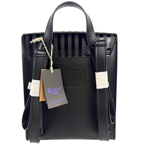 Dr. Martens Wednesday Adams Backpack, Corran Loafers, and Outcasts Are In Socks - Picture 10 of 16